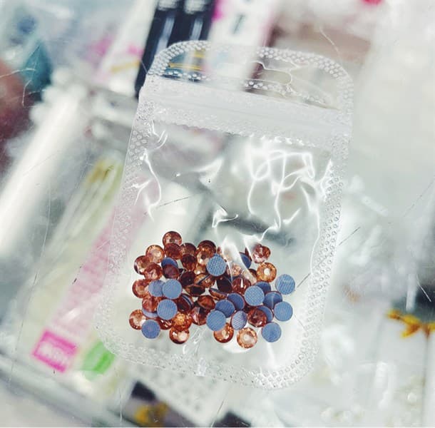 Túi đá chân lưới 50 viên màu đào
